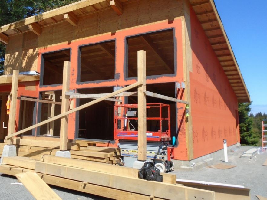 Front elevation showing trellis posts High posts are erected on south side to accept sheathing