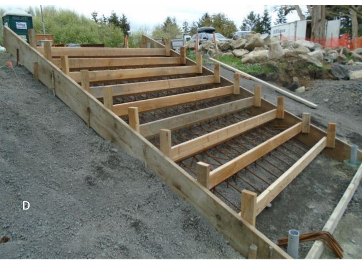 Parkigng lot steps reinforced, framed, and ready for concrete View of final preparations for concrete steps between parking lots