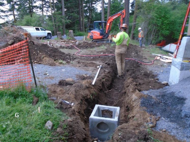 View of trench that has been dug to accept drainage pipe