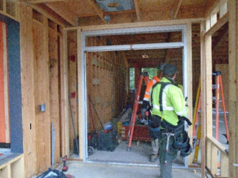 Entry vestibule framed and ready for doors Framing and supports for main entry doors in vestibule