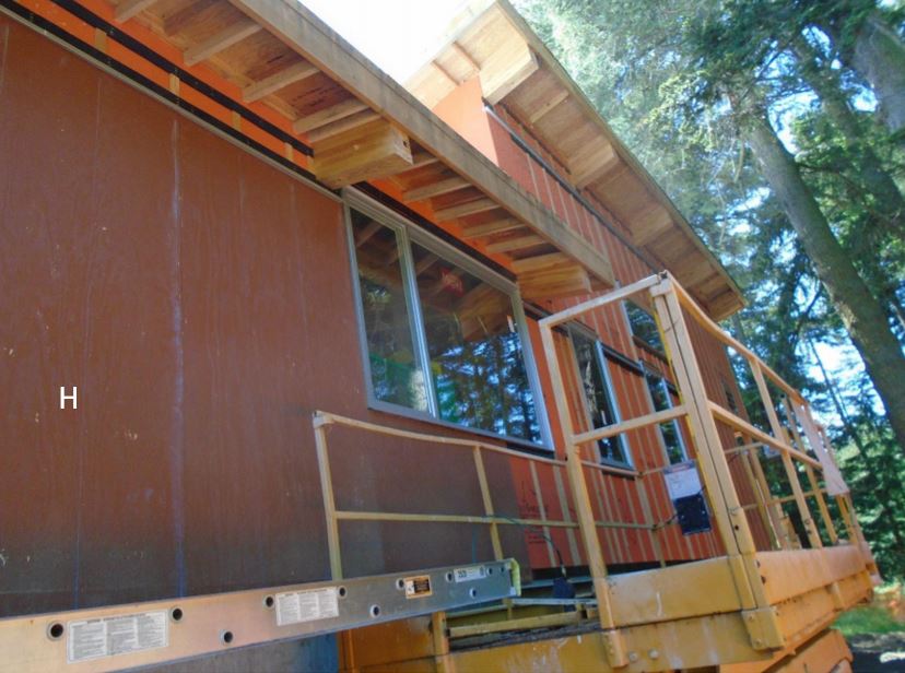 Plywood boards installed for siding Plywood boards ready for new siding