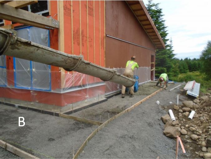 Pouring concrete walkway on south side of the building
