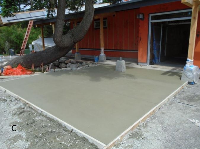 Concrete pad poured at entrance Pad for entryway to main building is poured and drying