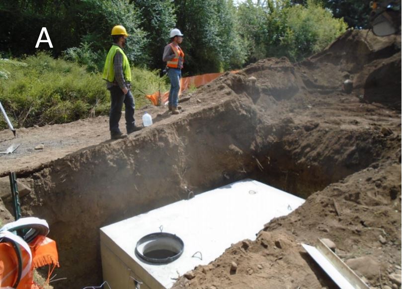 Septic tank being set into place