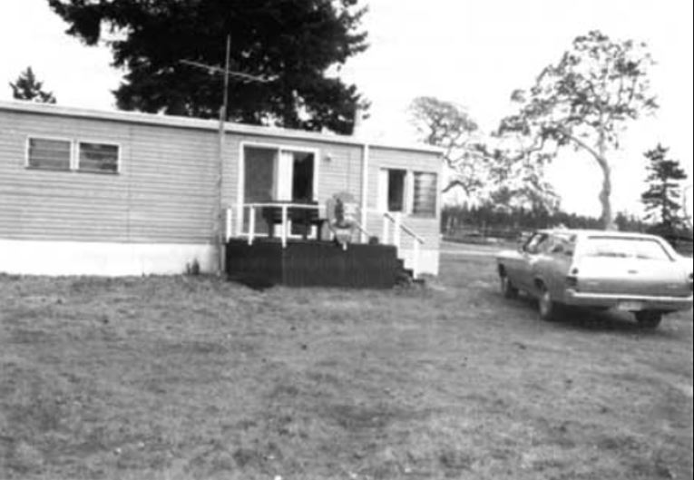 Temporary HQ shelter at American Camp Black and white of temporary trailer at American Camp