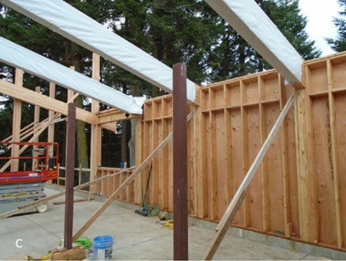 Roofing beams being installed Roofing beams being installed
