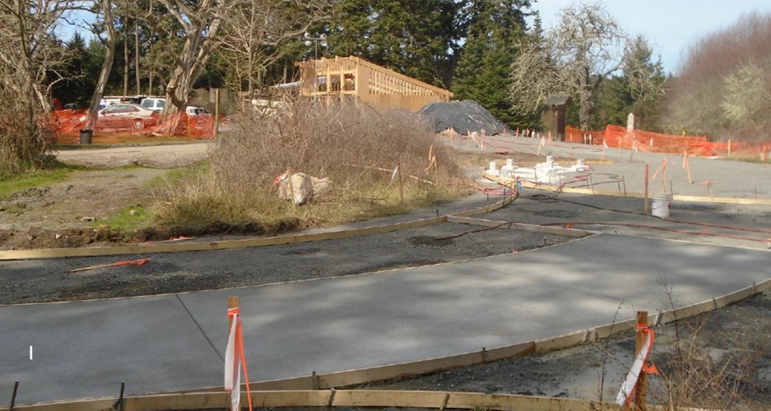 A wide angle photo from south to north showing most of the site and its progress