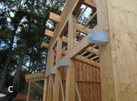 Close-up of structure from Southwest corner showing brackets which will hold trellis structure