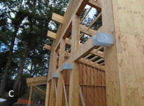 Close-up front elevation showing brackets awaiting trellis Close-up of structure from Southwest corner showing brackets which will hold trellis structure