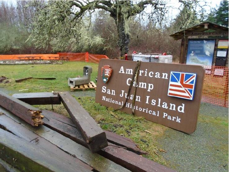 Reclaimed wood and park signage is staged for future reuse
