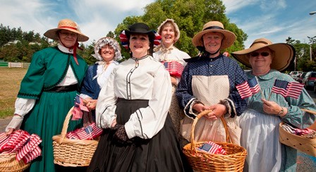 Volunteers 4th of july Volunteers dressed in period clothing gather for the 4th of july parade