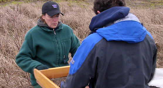 Julie Stein works with Uiversity of Washington students at American Camp.