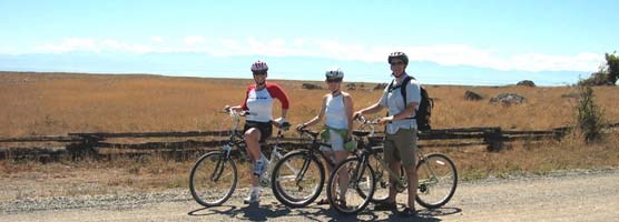 Cyclists pause to enjoy the view on the Redoubt Road at American Camp Cyclists pause to enjoy the view on the Redoubt Road at American Camp