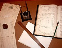 the tools of a 19th century Customs Inspector included pens, inkwells, rulers, and paper forms the tools of a 19th century Customs Inspector included pens, inkwells, rulers, and paper forms