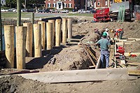 workmen placing footings for Pedrick Store House