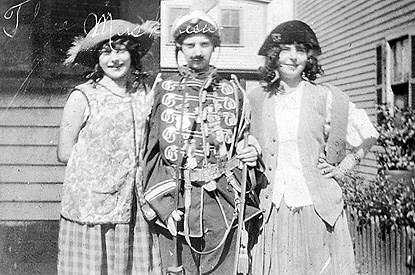 Three girls dressed in costumes Three girls dressed in costumes