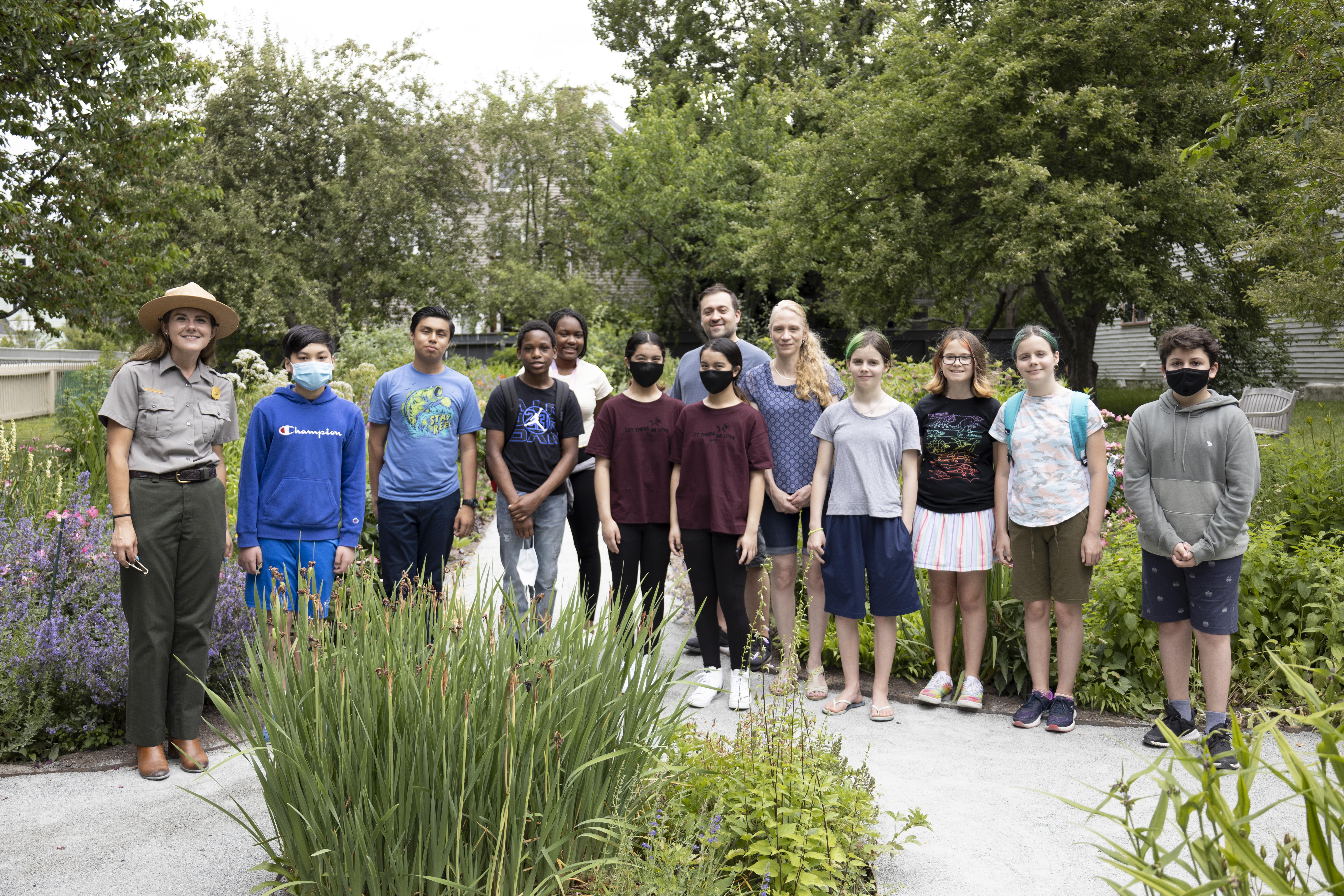 Hard History Pilot Program A park ranger stands with a group of students