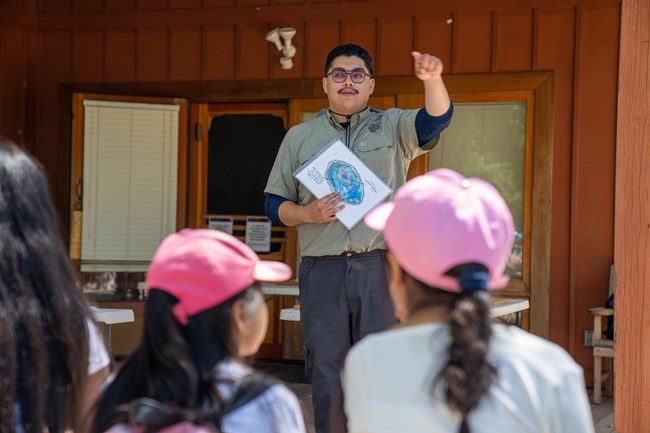 EKO Intern leading an educational program to 4th grade students