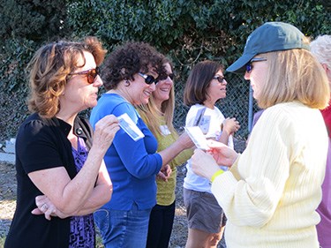 Teachers try out a classroom activity with one another during a teacher workshop. Teachers try out a classroom activity with one another during a teacher workshop.