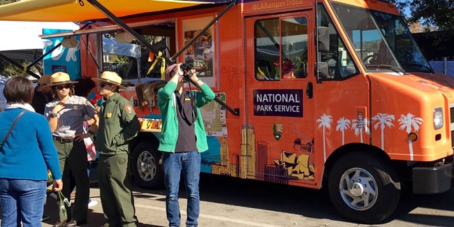 Rangers interacting with the public.