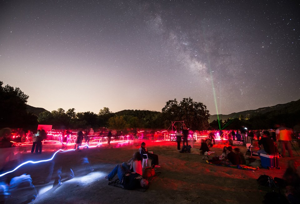 The Milky Way rises above a star party at Paramount Ranch. Star party with Milky Way in sky