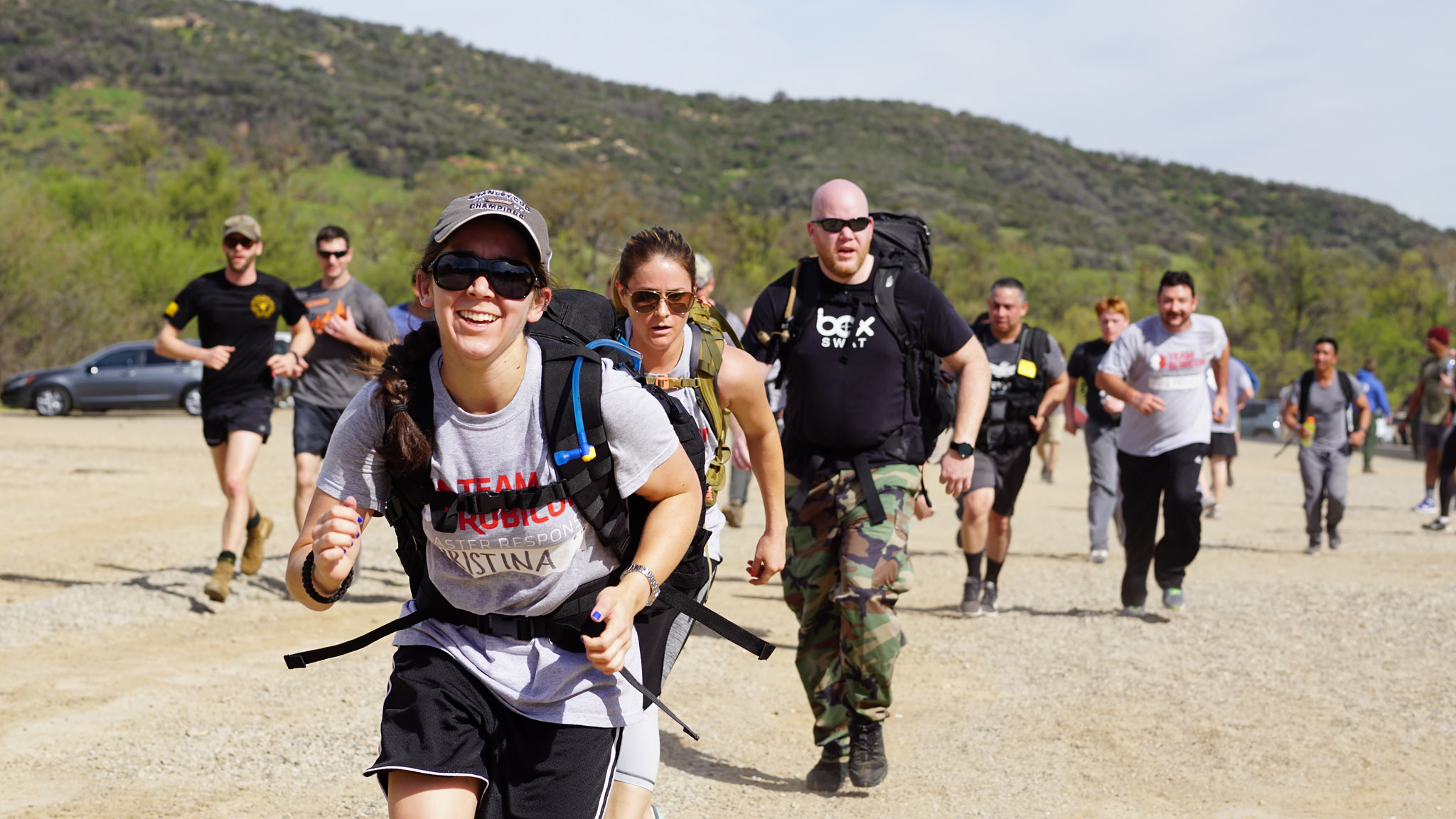 Veterans running with packs