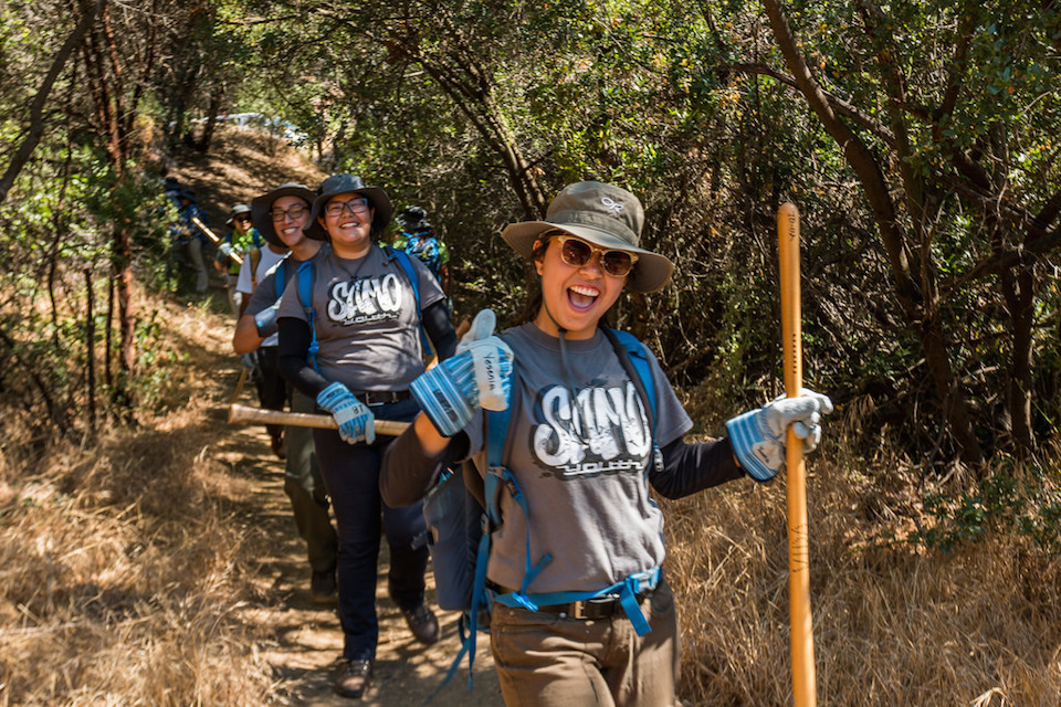 SAMO Youth crew members perform trail work at Circle X Ranch.