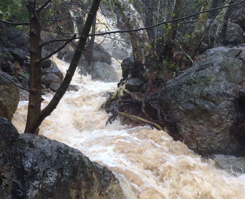 The creek in Solstice Canyon rushes with water after a heavy winter storm