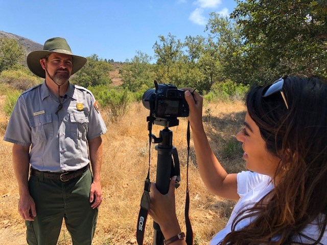 Park Ranger being interviewed