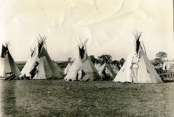Historic Cheyenne camp with several lodges.