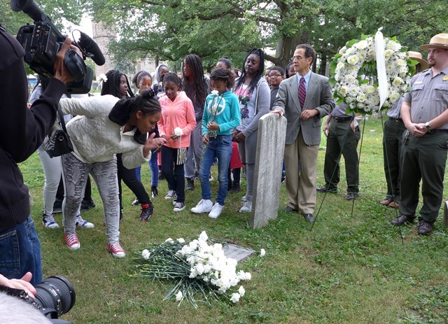 Students of Rebecca Turner Elementary and Benjamin Turner Middle School in Mount Vernon, New York, lay carnations at Rebecca Turner's gravesite at St. Paul's Church National Historic Site. Students of Rebecca Turner Elementary and Benjamin Turner Middle School in Mount Vernon, New York, lay carnations at Rebecca Turner's gravesite at St. Paul's Church National Historic Site.