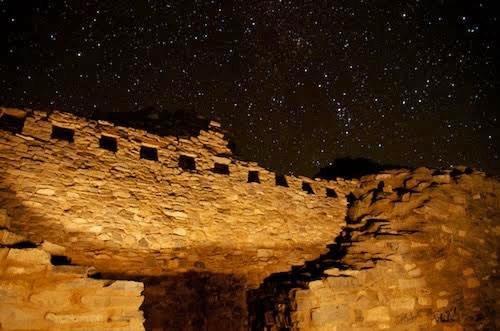 A starry night sky surrounds the ruins of the Gran Quivira mission.