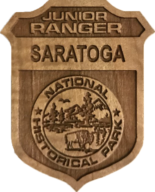 Saratoga NHP Junior Ranger Badge wooden junior ranger badge with saratoga in the top banner