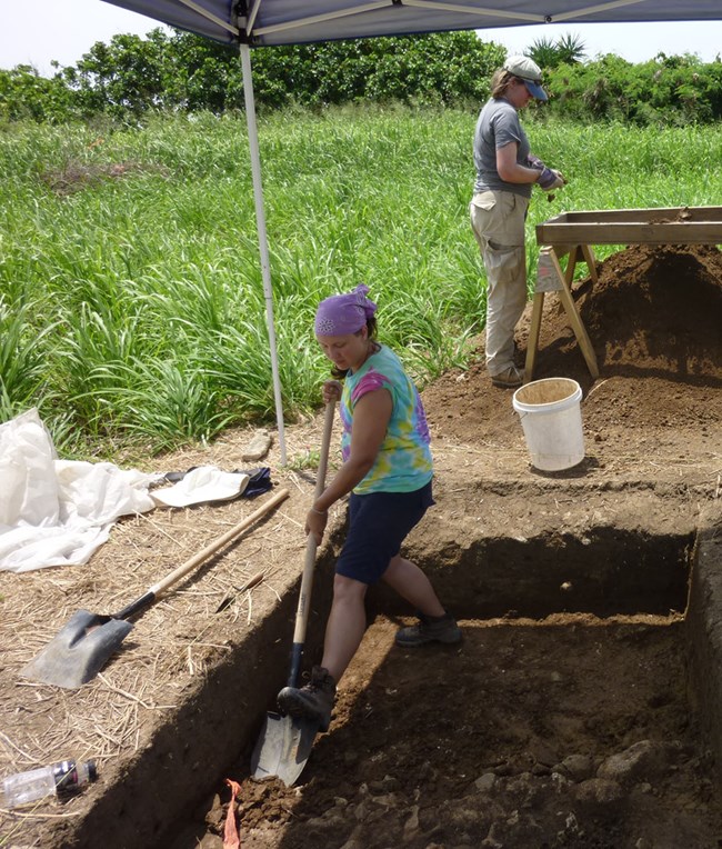 Photograph of archeologists digging at a site in Salt River.