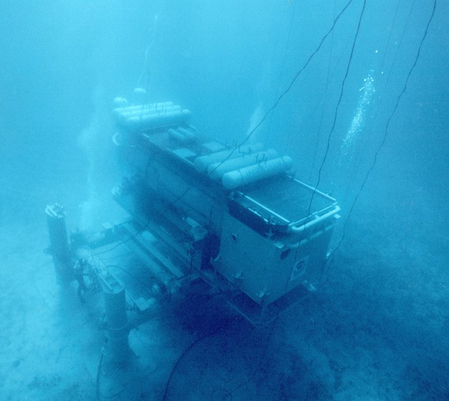 Underwater photograph of NOAA's Hydrolab facility, sitting at 50 feet below the surface.
