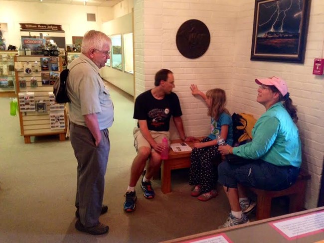 Visitor center host with visitors