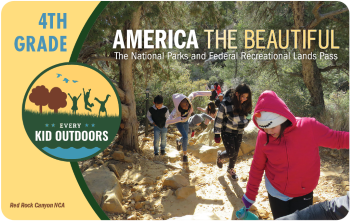 The 2023 - 24 Every Kid Outdoors Pass features an image of students hiking in a wooded area.