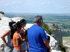 Visitors looking over the city of Scottsbluff from the summit of the Scotts Bluff National Monument Visitors looking over the city of Scottsbluff from the summit of the Scotts Bluff National Monument