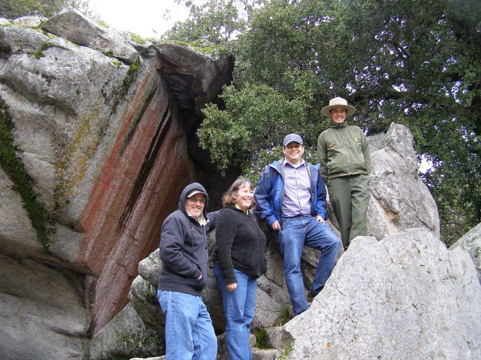 A ranger introduces teachers to Hospital Rock. A ranger introduces teachers to Hospital Rock.
