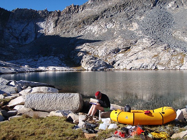 Biological technician collects lake water quality data, State Lakes, Kings Canyon National Park.