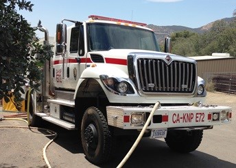 Engine 72 works on a fire in the parks. Engine 72 works on a fire in the parks.
