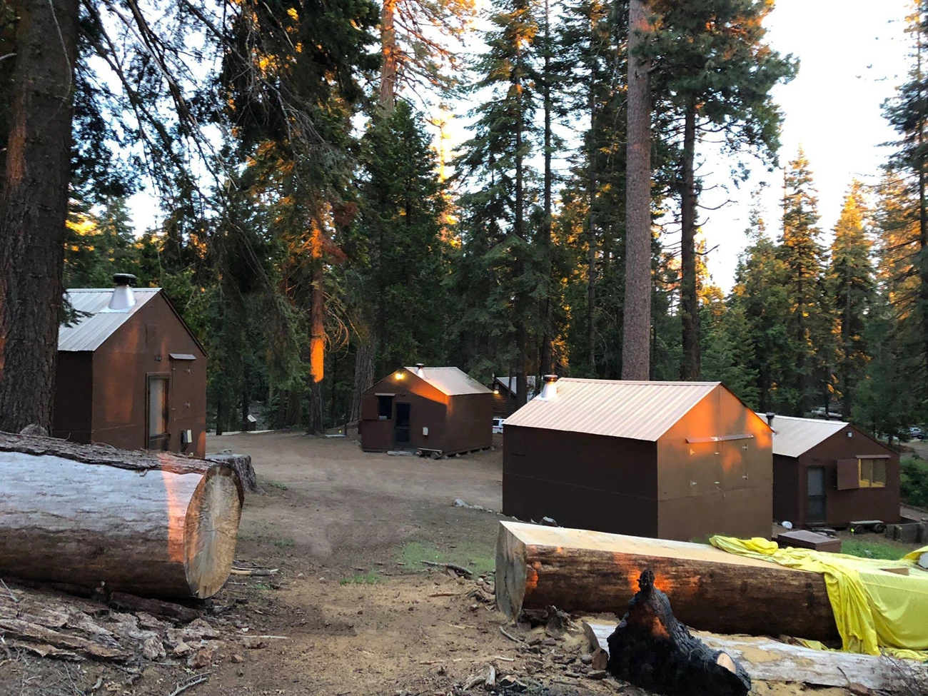 Rustic cabins in a forest Rustic cabins in a forest