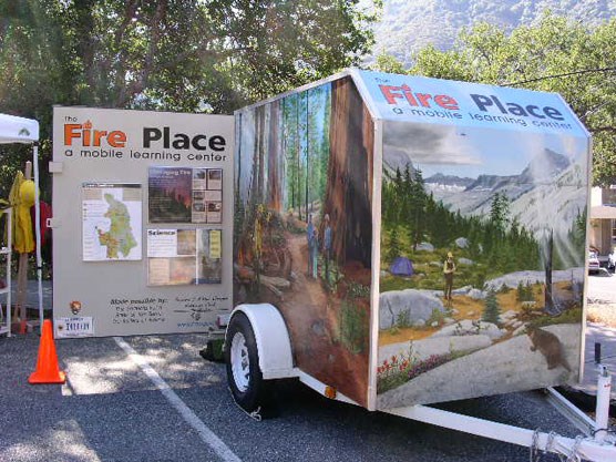 "The Fire Place" has three colorful murals showing fire activities. "The Fire Place" has three colorful murals showing fire activities.