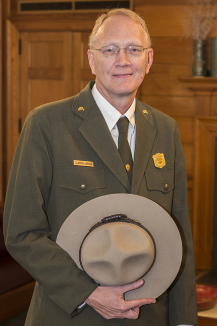 Superintendent Clay Jordan Superintendent Clay Jordan in NPS service dress uniform, holding his flat hat.