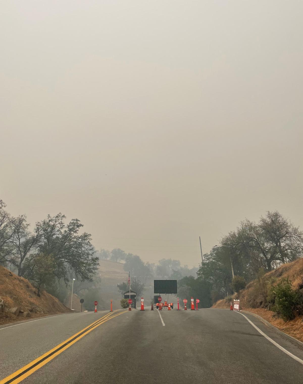 Sequoia National Park park entrance engulfed in greyish smoke from wildfire on 9/12/21