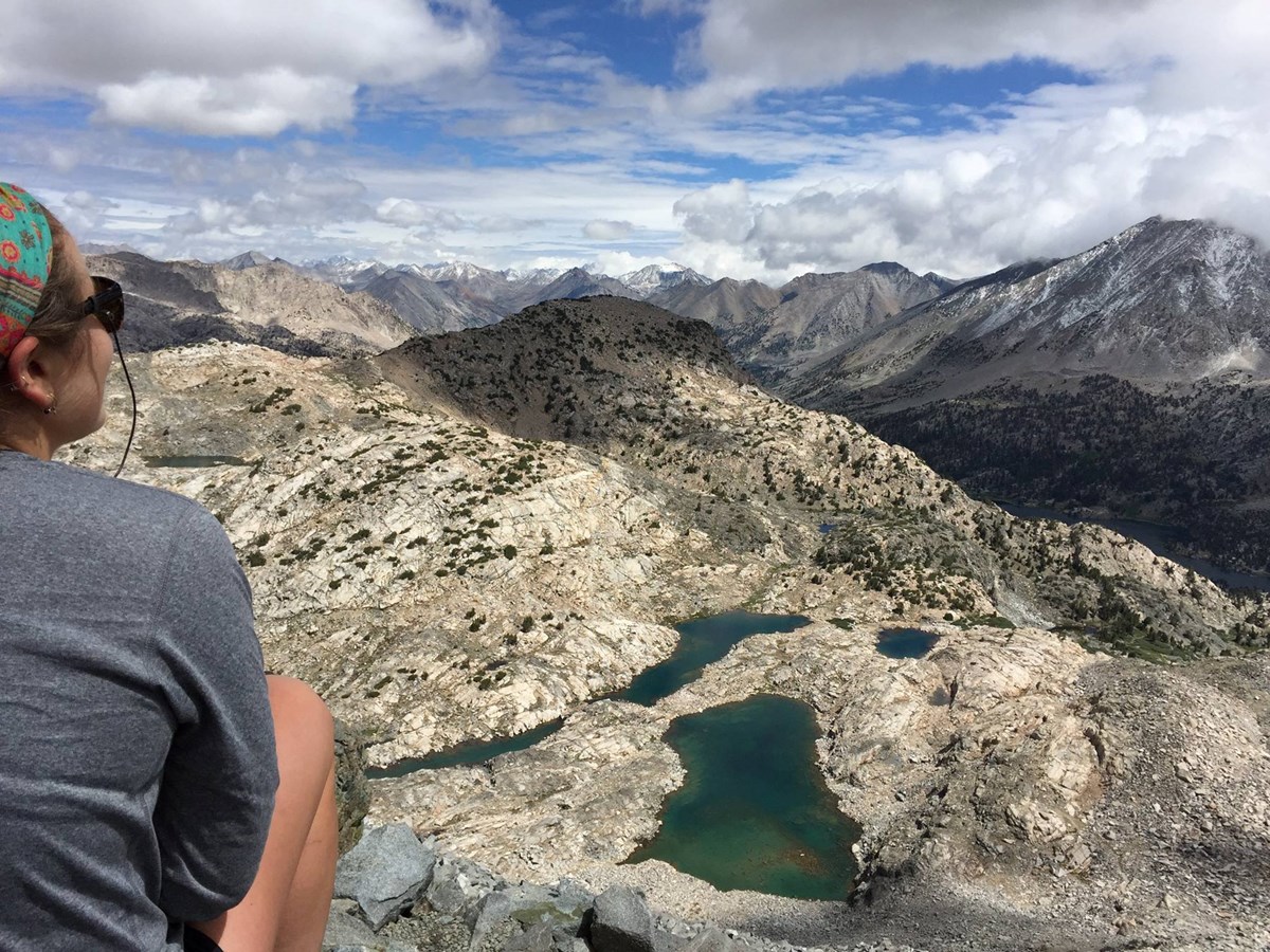 Person looking out from the top of Glen Pass