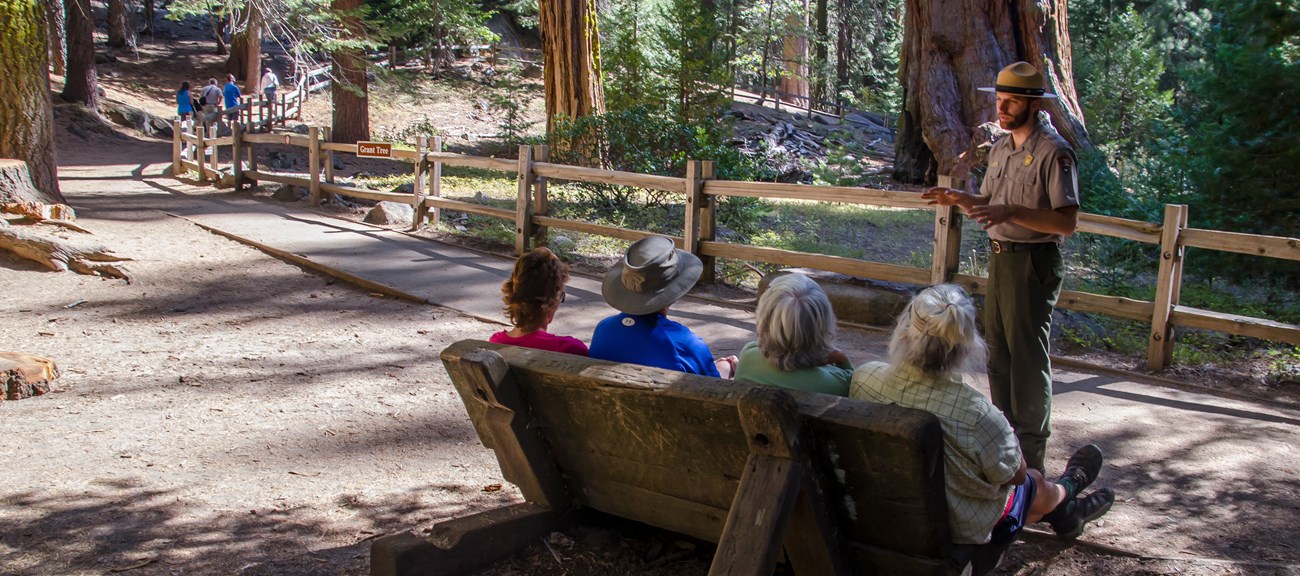 A ranger gives a talk along the trail