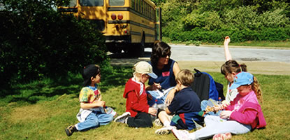 A teacher and her students on a self-guided education program.