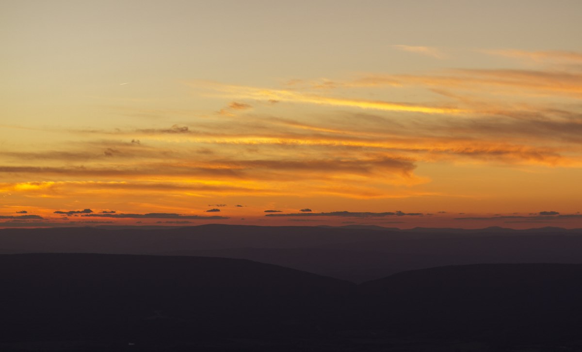 Stony Man at Sunset - cropped A view of distant valley and mountains with the sun setting in the background.