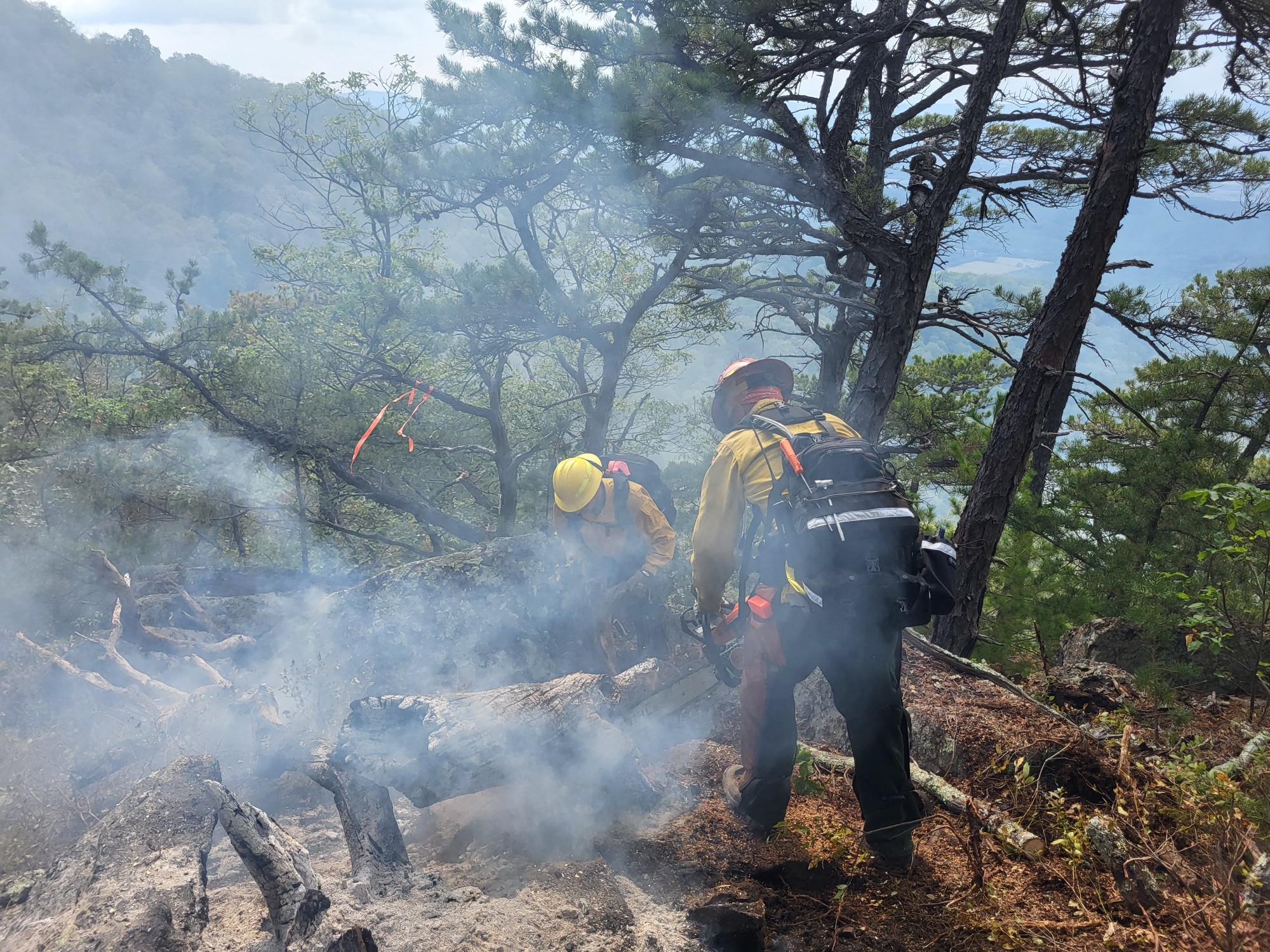 20230909_MillersHeadFire Firefighters mop up debris for the Millers Head fire